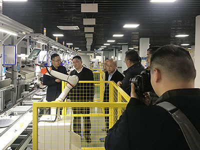 Using High Precision Robot Arm to Create Intelligent Production Line for Charging Station
